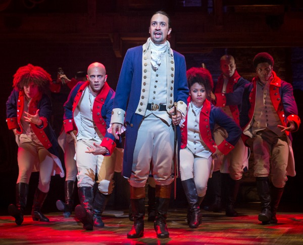  Lin-Manuel Miranda (center) as Alexander Hamilton. Photo by Sara Krulwich/The New York Times 
