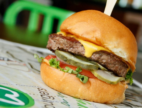 At Wahlburger's, behold, the Wahlburger. Go, too, for the signature beer — the Wahlbrewski. Photo: Nicoletta Amato Photography